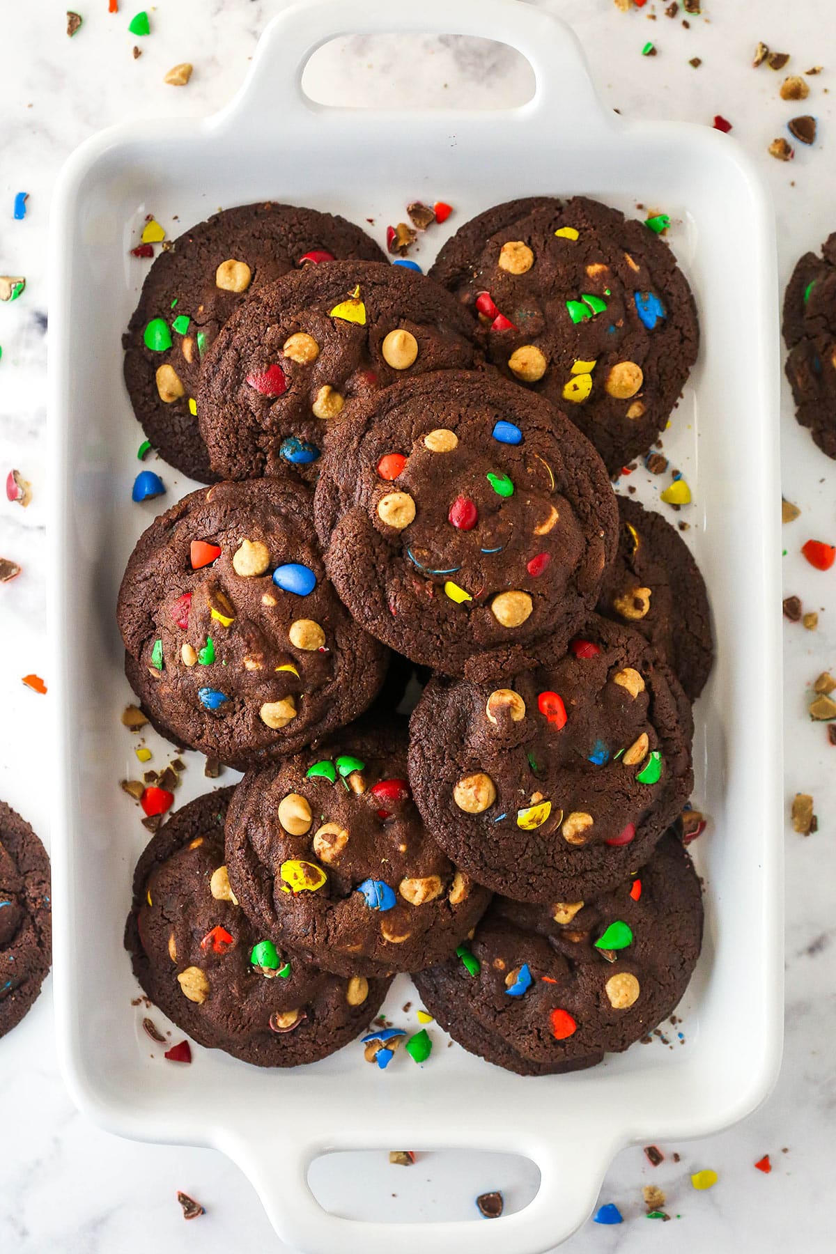 Overhead view of peanut butter M&M cookies on a tray