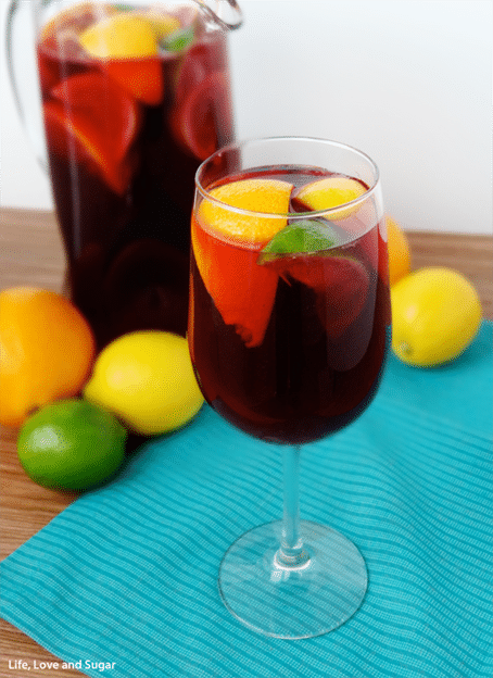 Easy Red Wine Sangria in a pitcher and a glass