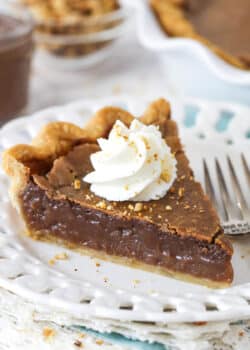 slice of chocolate hazelnut chess pie on a white plate