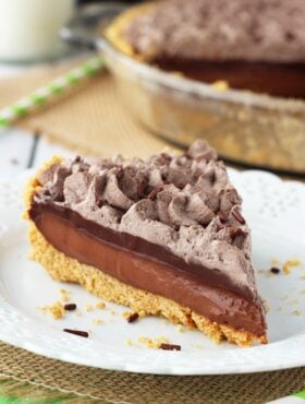 A slice of Baileys Chocolate Pie on a white plate