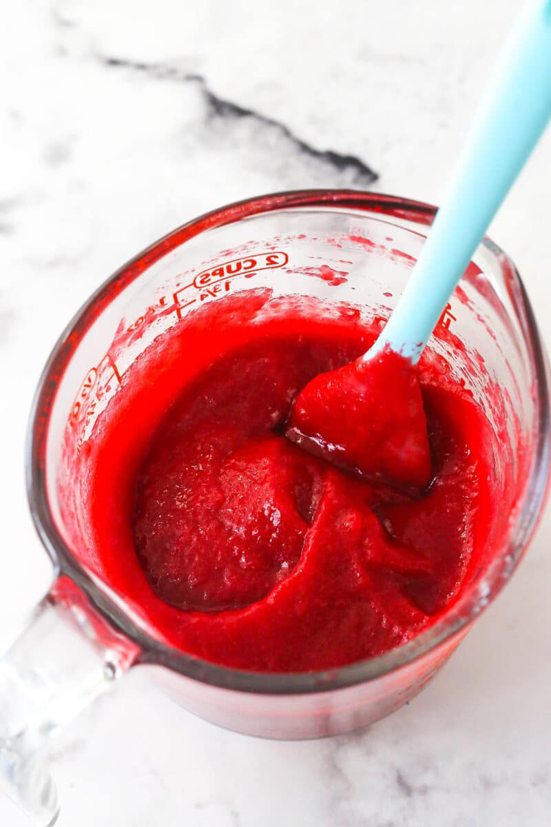 Raspberry filling in a measuring cup