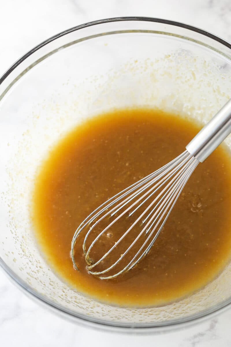 Brown sugar and melted butter in a bowl