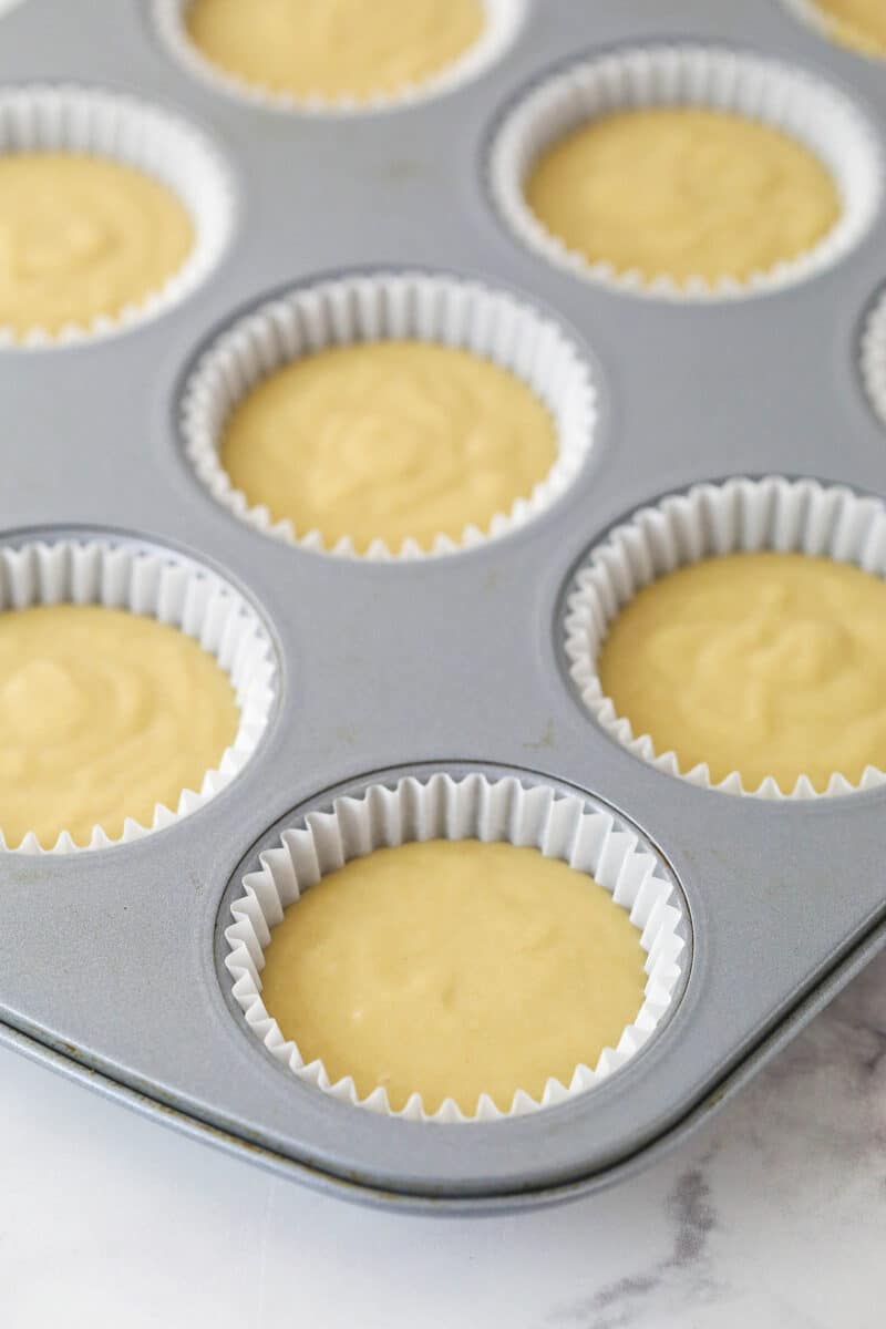 Brown sugar cupcake batter in cupcake liners