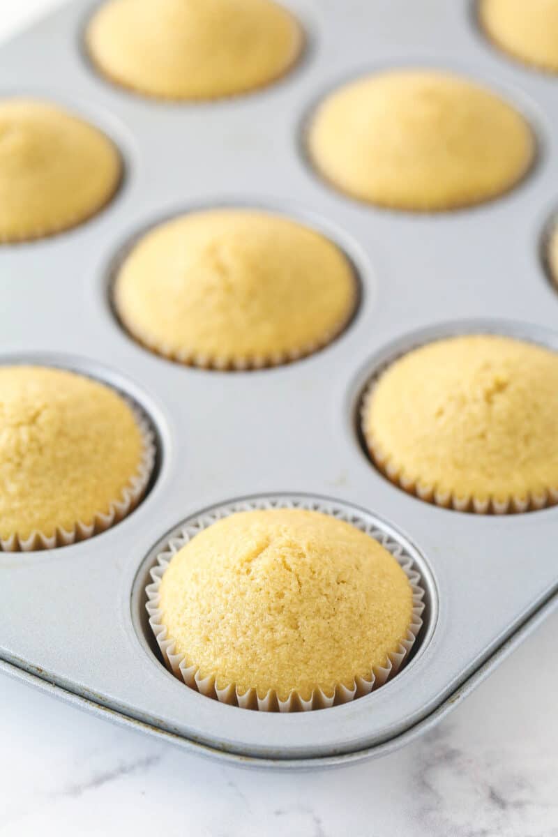 Baked brown sugar cupcakes in a cupcake tin