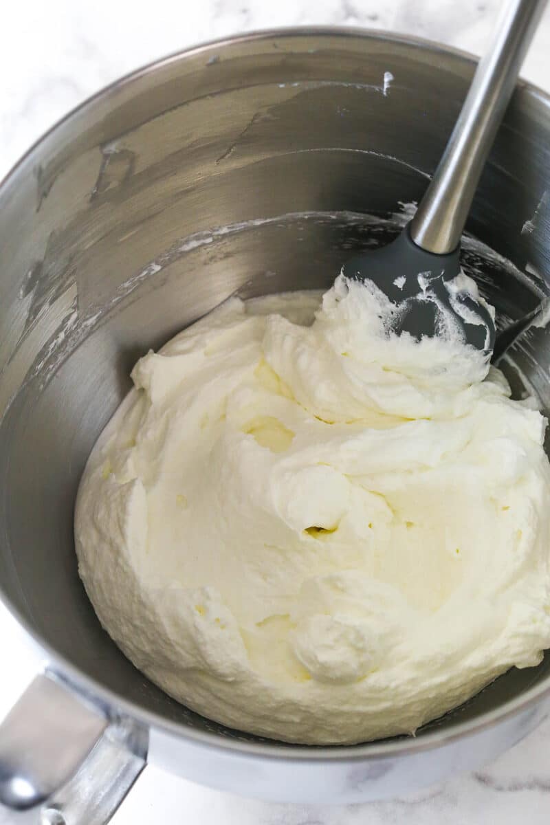 Whipped cream in a metal bowl