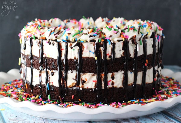 Side view of a Cake Batter Fudge Brownie Ice Cream Cake on a plate