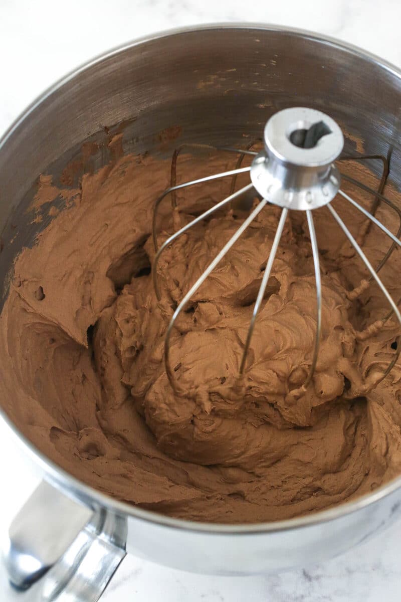 chocolate whipped cream in metal mixing bowl