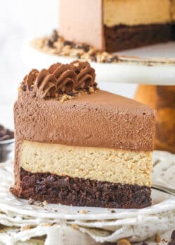 slice of peanut butter chocolate mousse cake on a white plate