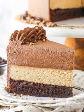 slice of peanut butter chocolate mousse cake on a white plate