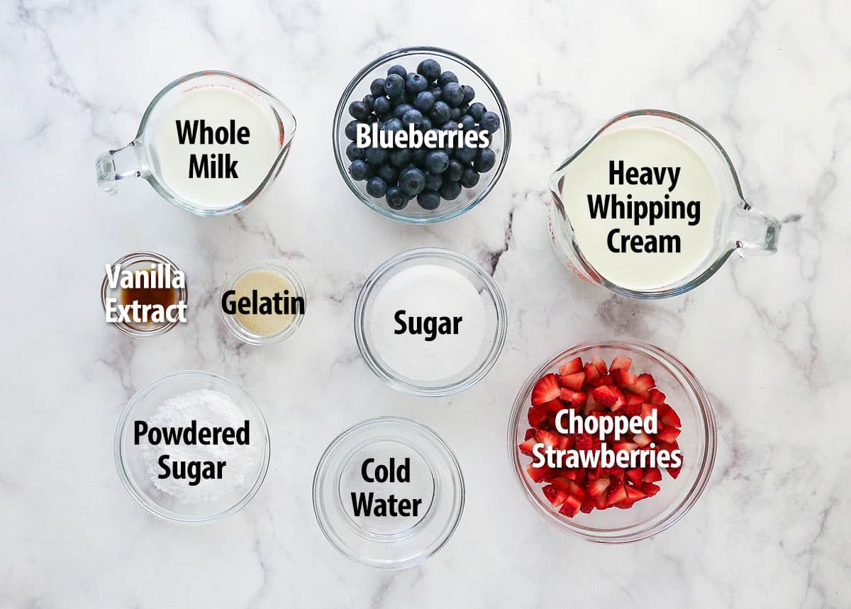 ingredients for panna cotta in glass bowls on marble background
