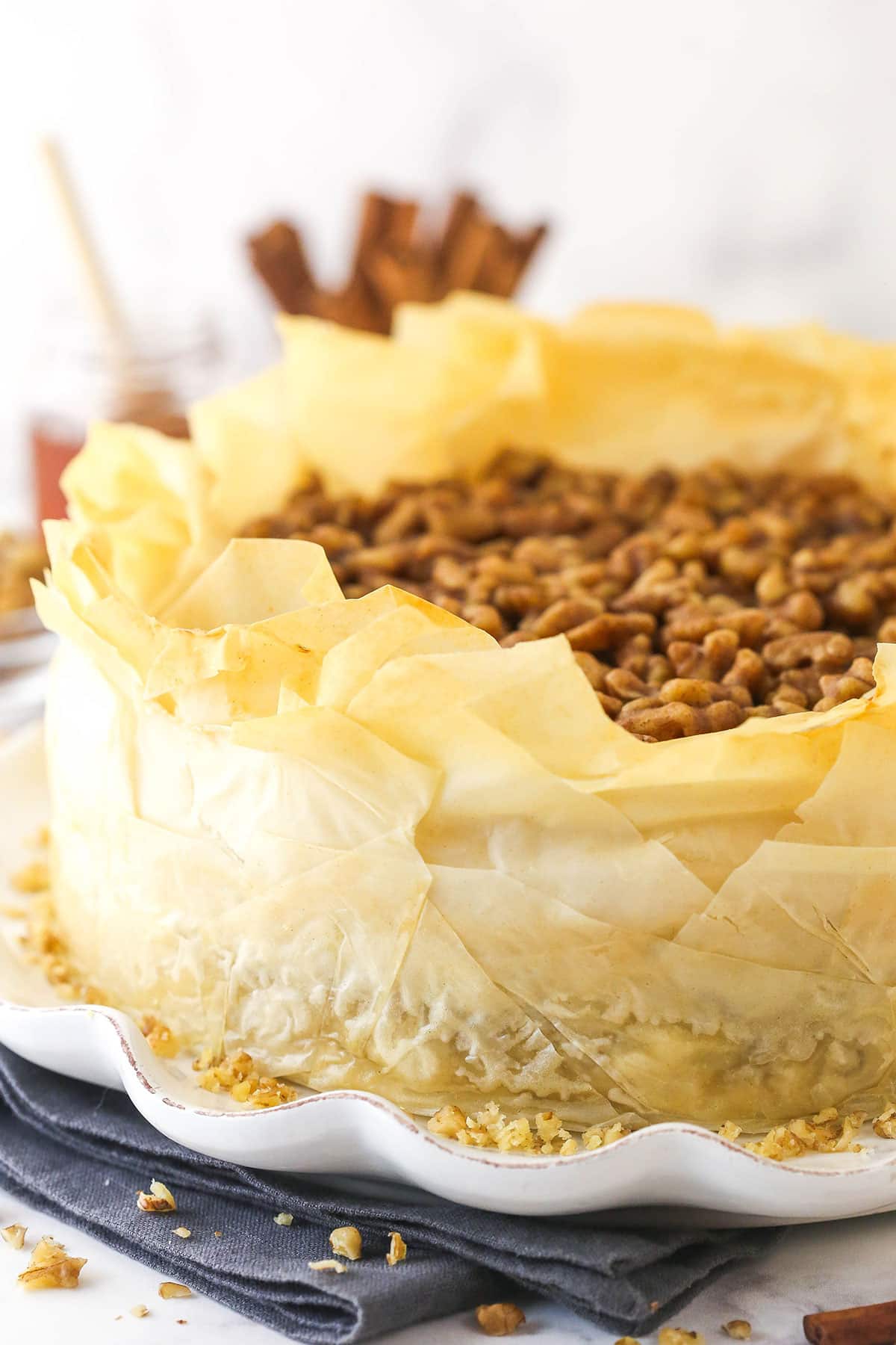 Baklava cheesecake on a white platter