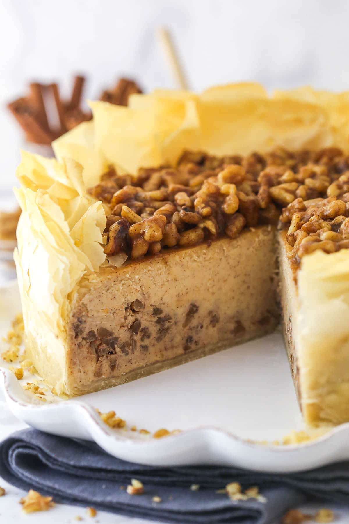 Baklava cheesecake with a slice missing