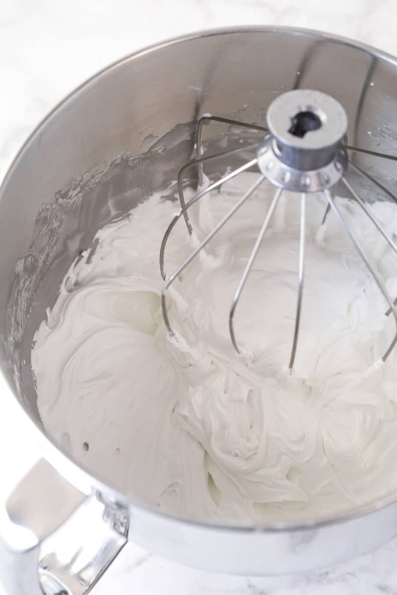 whipped, thick royal icing in mixing bowl