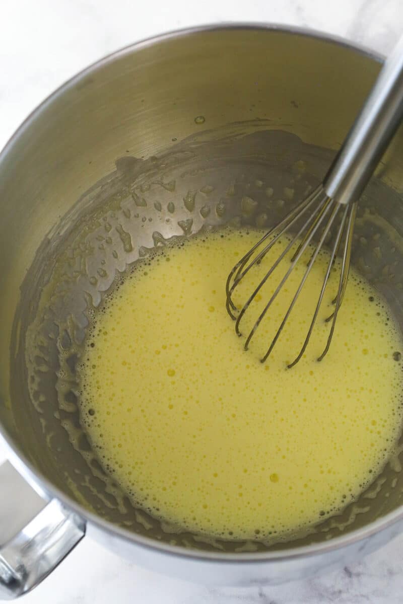 Whisk the egg yolks and sugar until the color changes