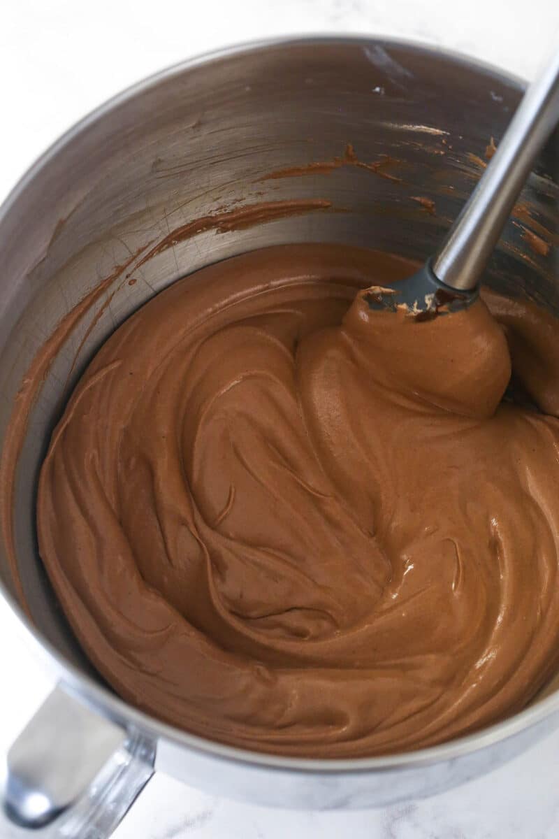 Combining the chocolate mixture with the whipped cream