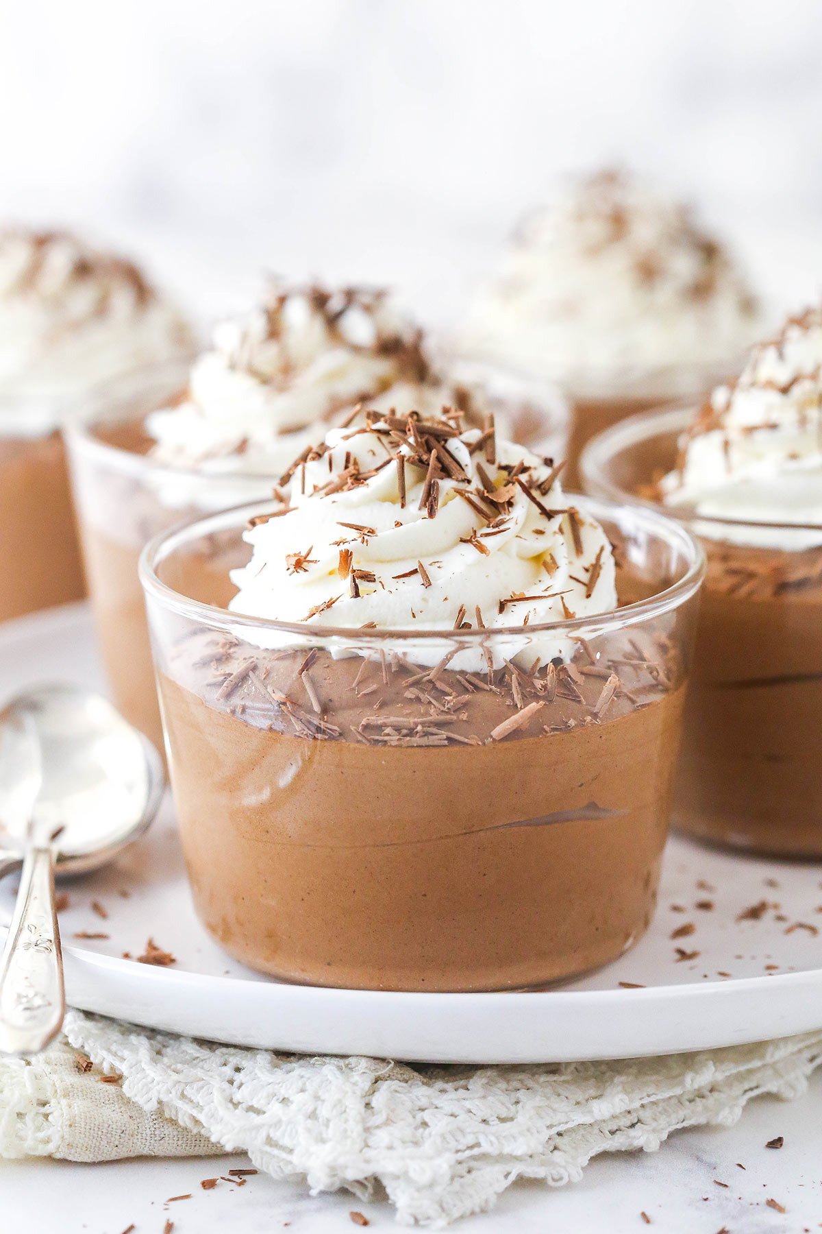 Chocolate mousse cups on a plate