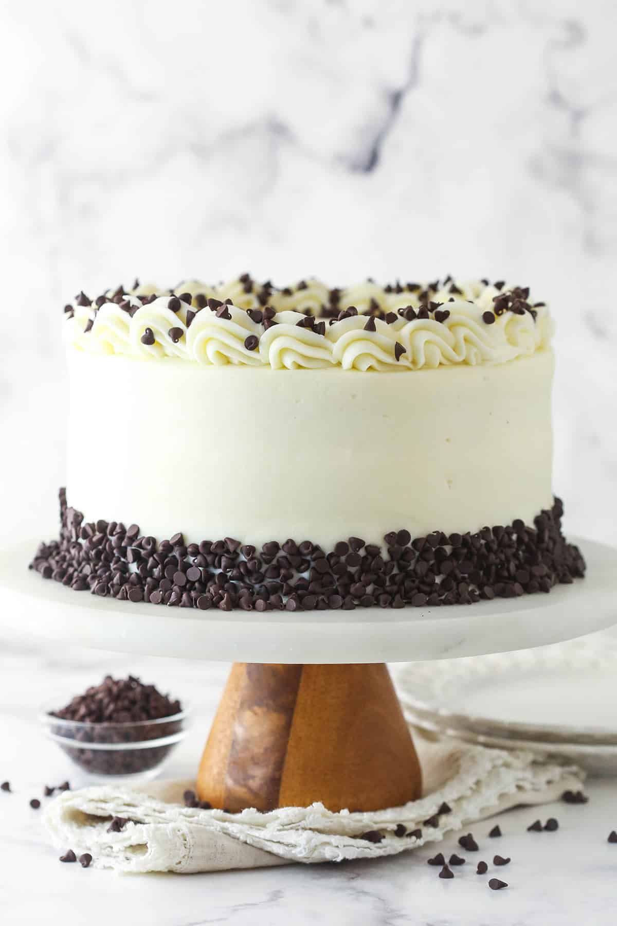 Cannoli layer cake on a cake stand