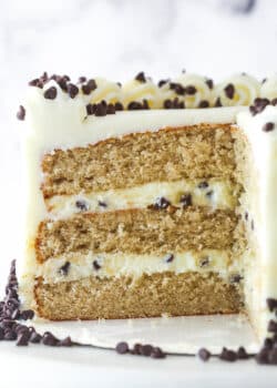 Cannoli layer cake with a slice missing