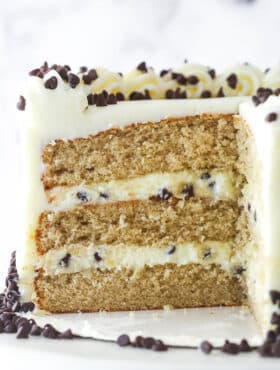 Cannoli layer cake with a slice missing