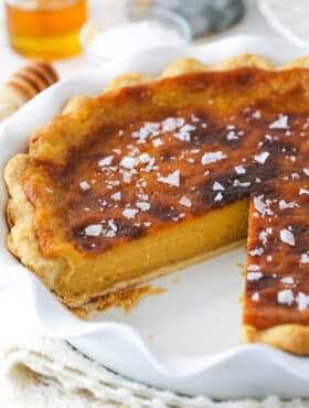 Salted honey pie with a slice missing