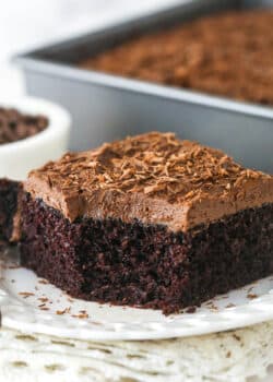 slice of chocolate sheet cake with a bite taken out