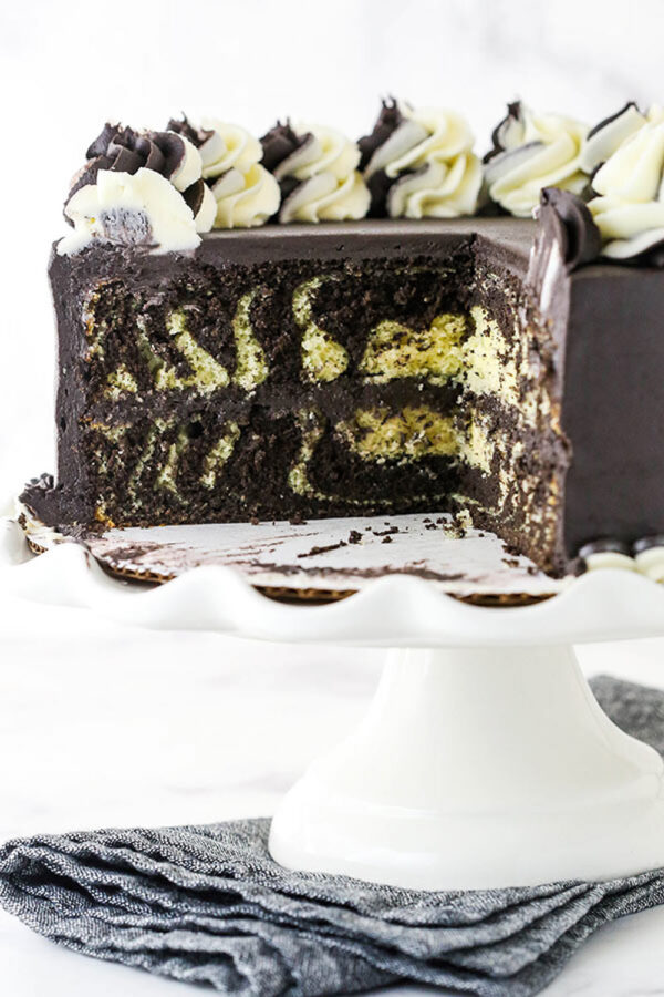 Three Quarters of a Zebra Layer Cake on a Dessert Stand