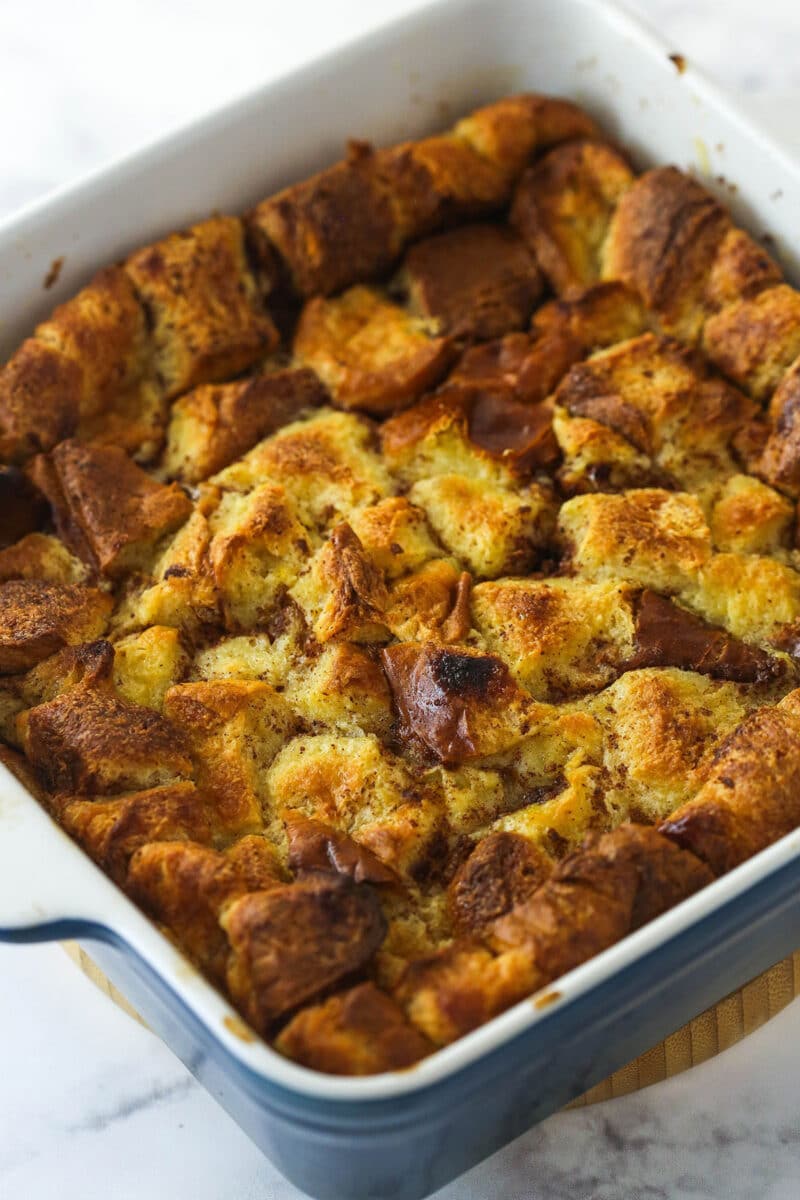 Baked bread pudding in a casserole dish.