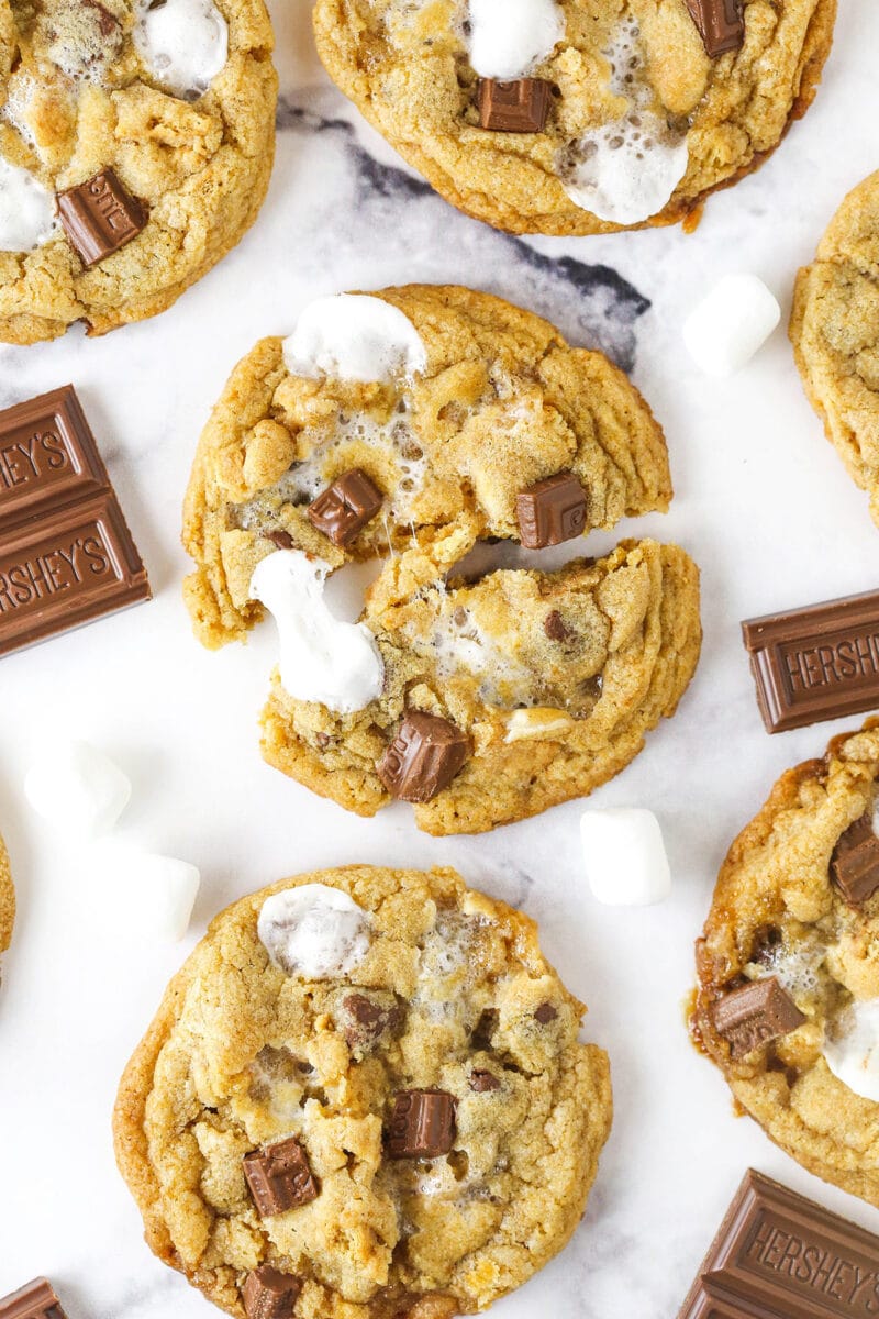 smores cookie broken in half with other cookies around it