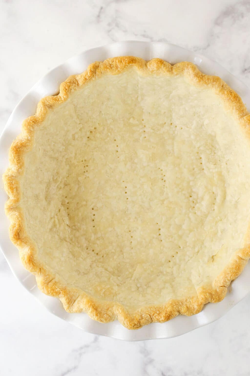 How to Blind Bake Pie Crust - Life Love and Sugar