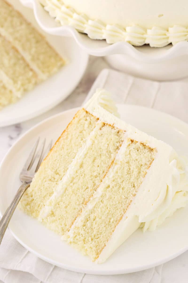 Light and Fluffy White Cake with Whipped Frosting | Life Love & Sugar