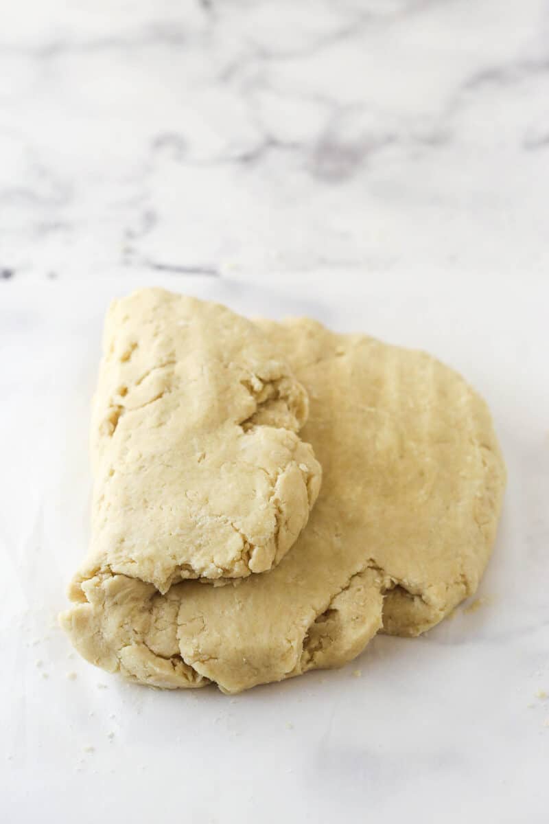 Folding shortcake biscuit dough into thirds.