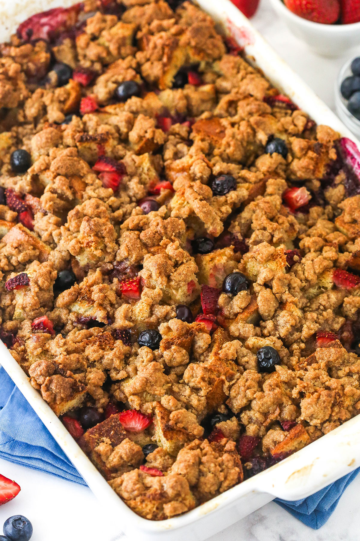 Overhead image of berry French toast casserole in a baking dish.