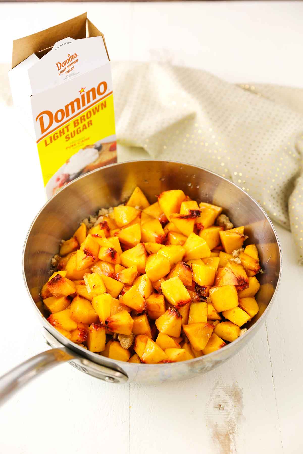 Uncooked peach filling ingredients in a pan