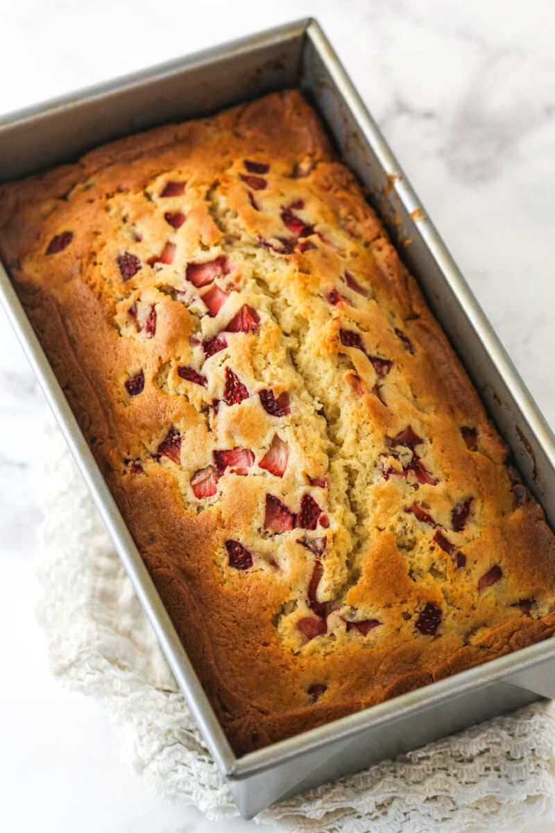 Strawberry bread in a loaf pan.