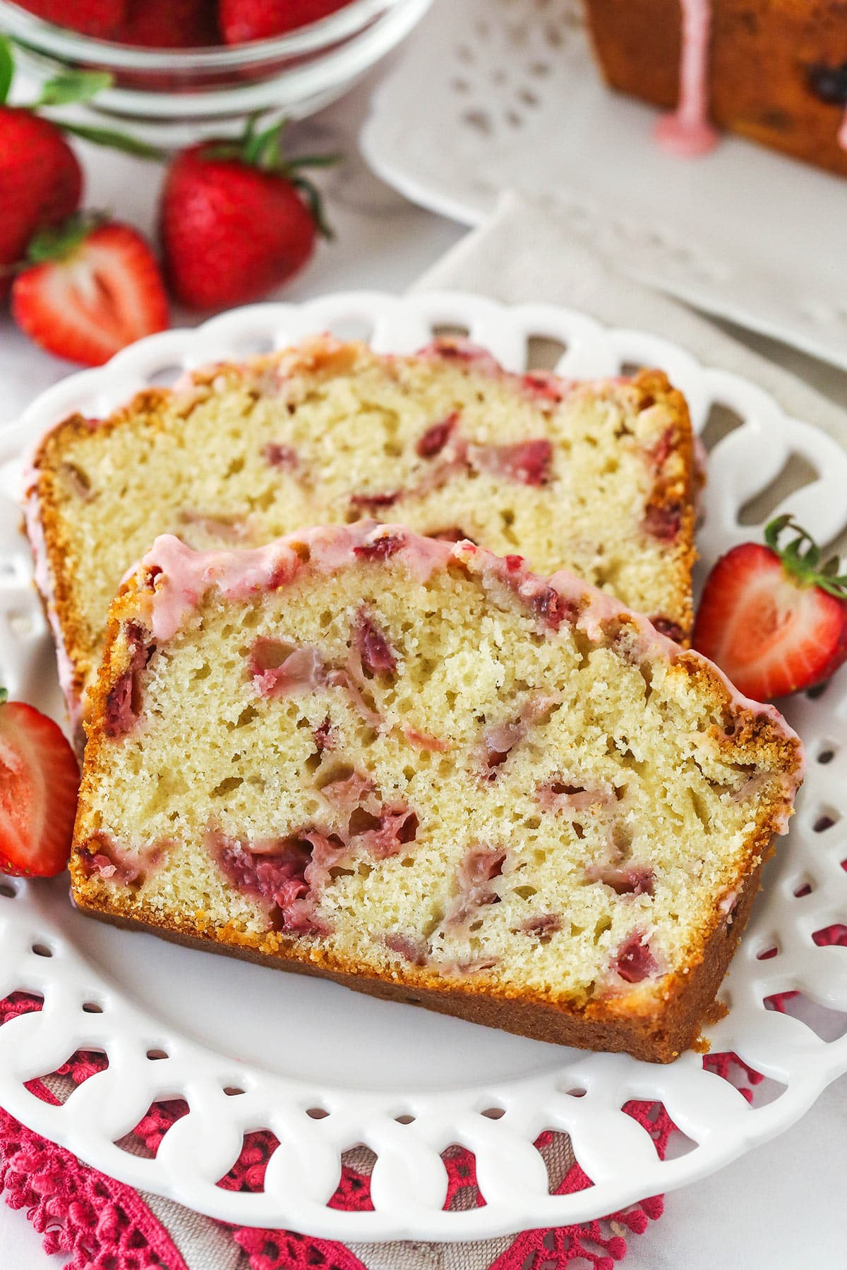 2 slices of strawberry bread on a plate.