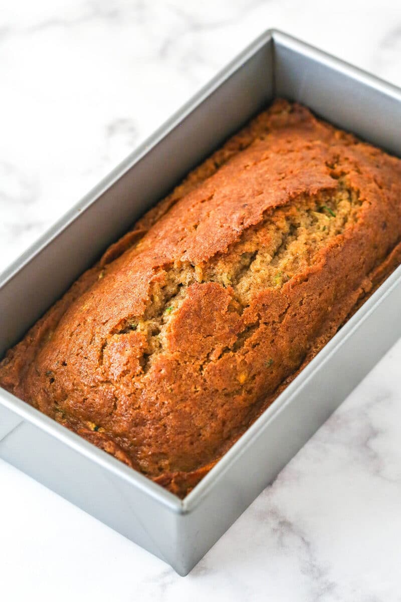 Zucchini bread in a loaf pan.