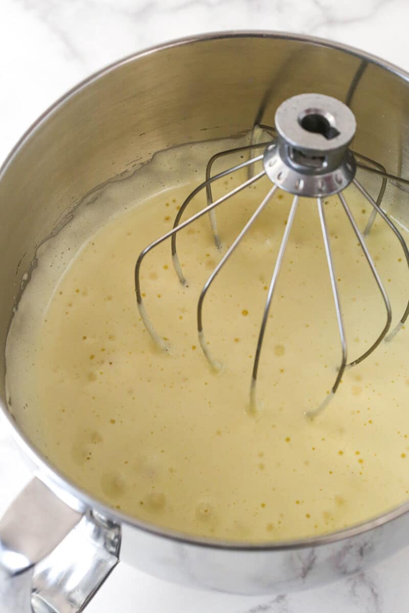 A mixer combining wet cake batter ingredients