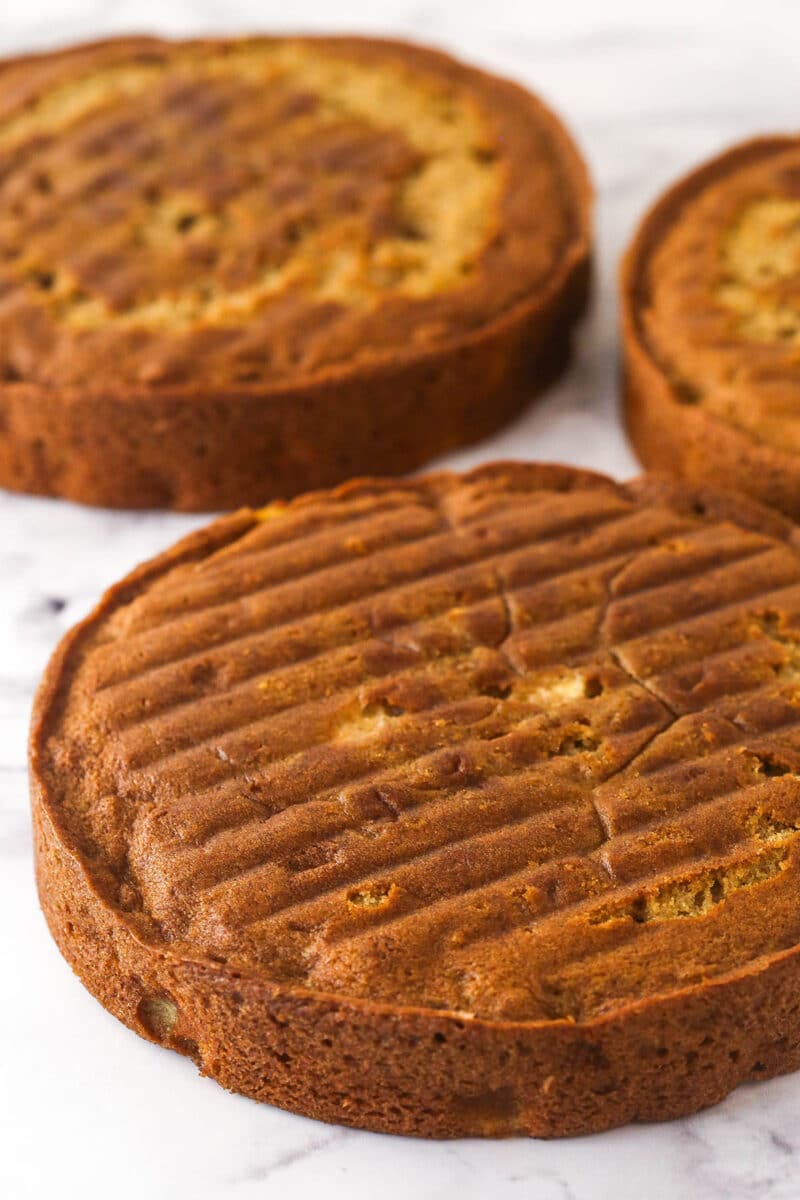 Three baked and cooled apple cakes.