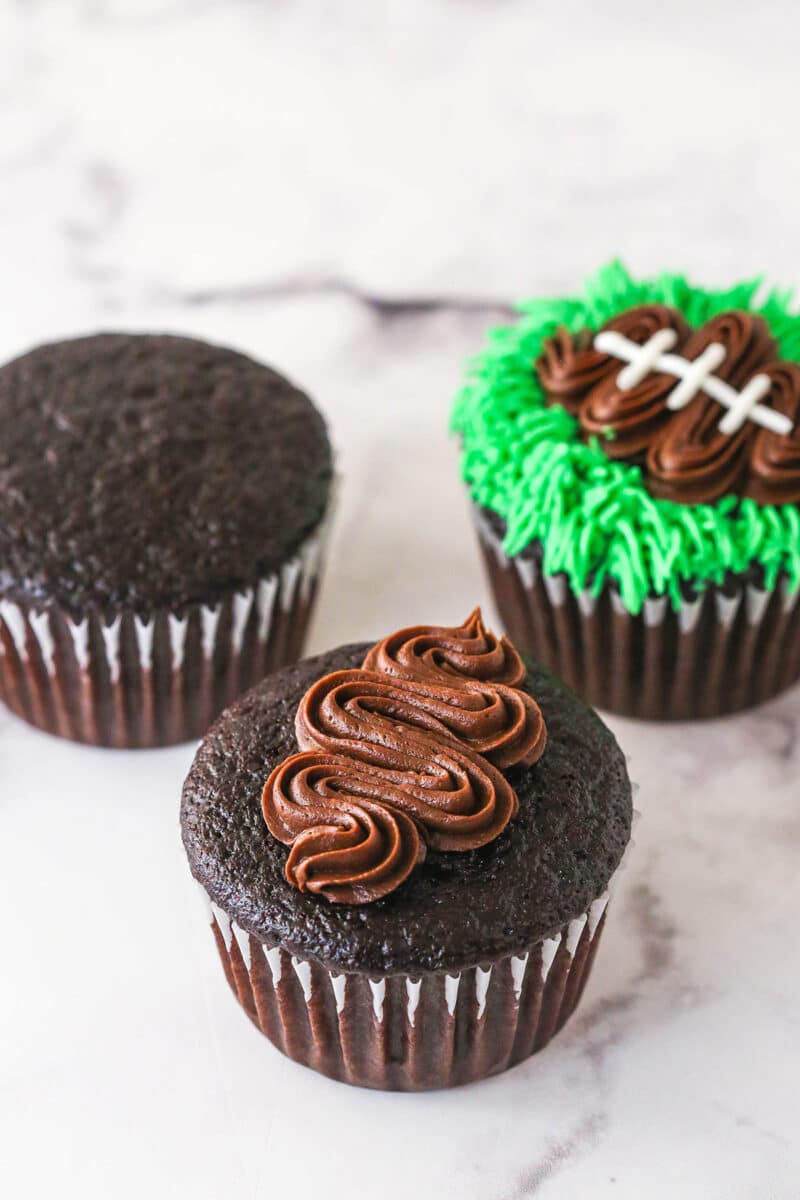 piped football on cupcake