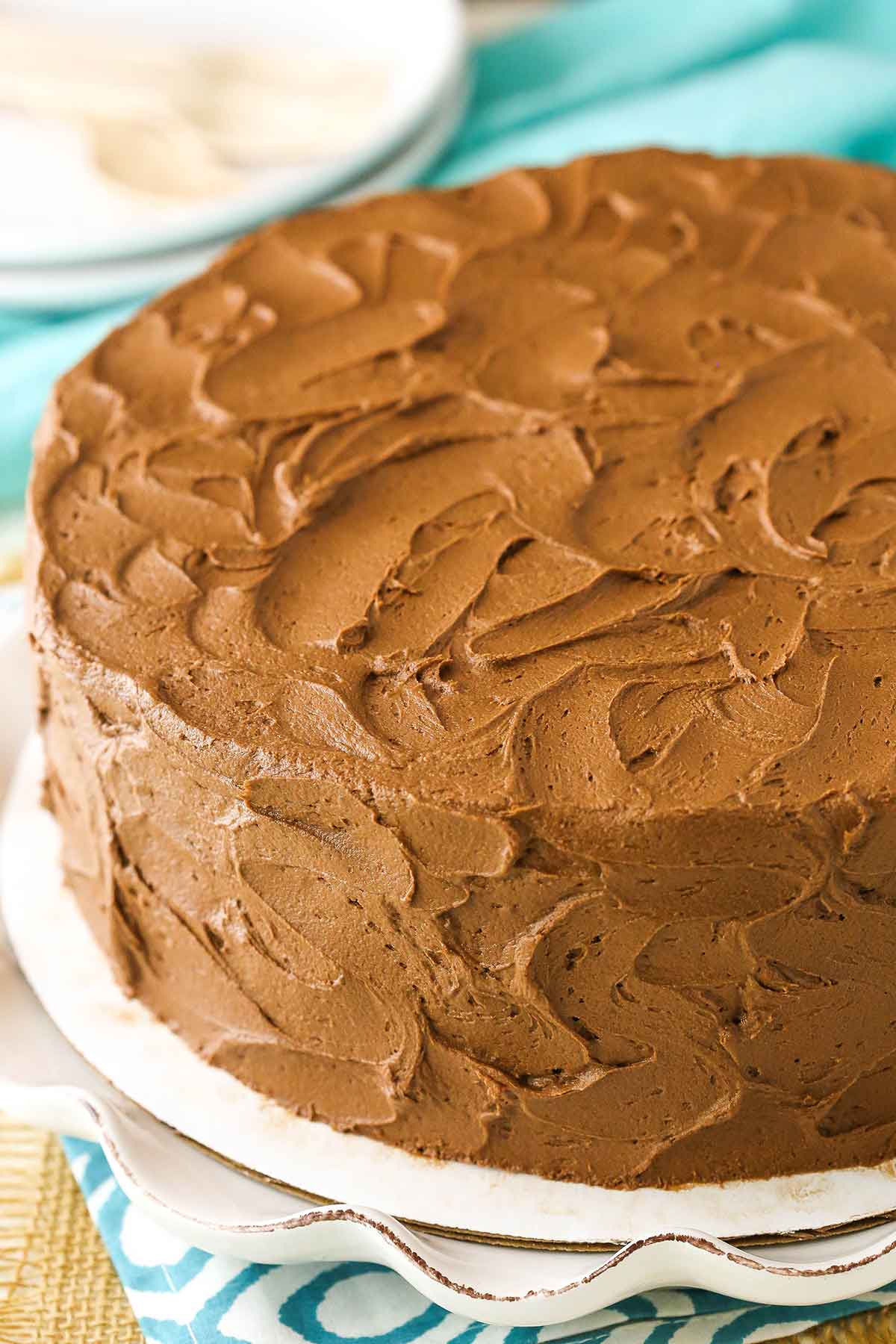 Overhead view of a full Marble Cake on a white platter