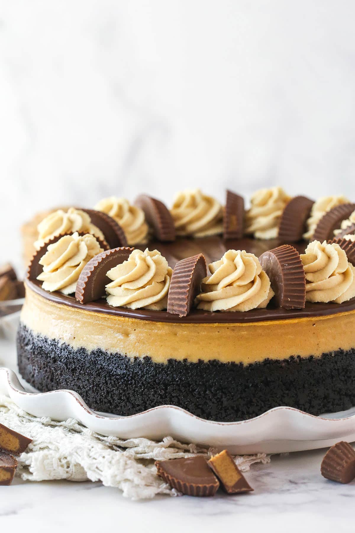 Side view of a Reese's chocolate peanut butter cheesecake