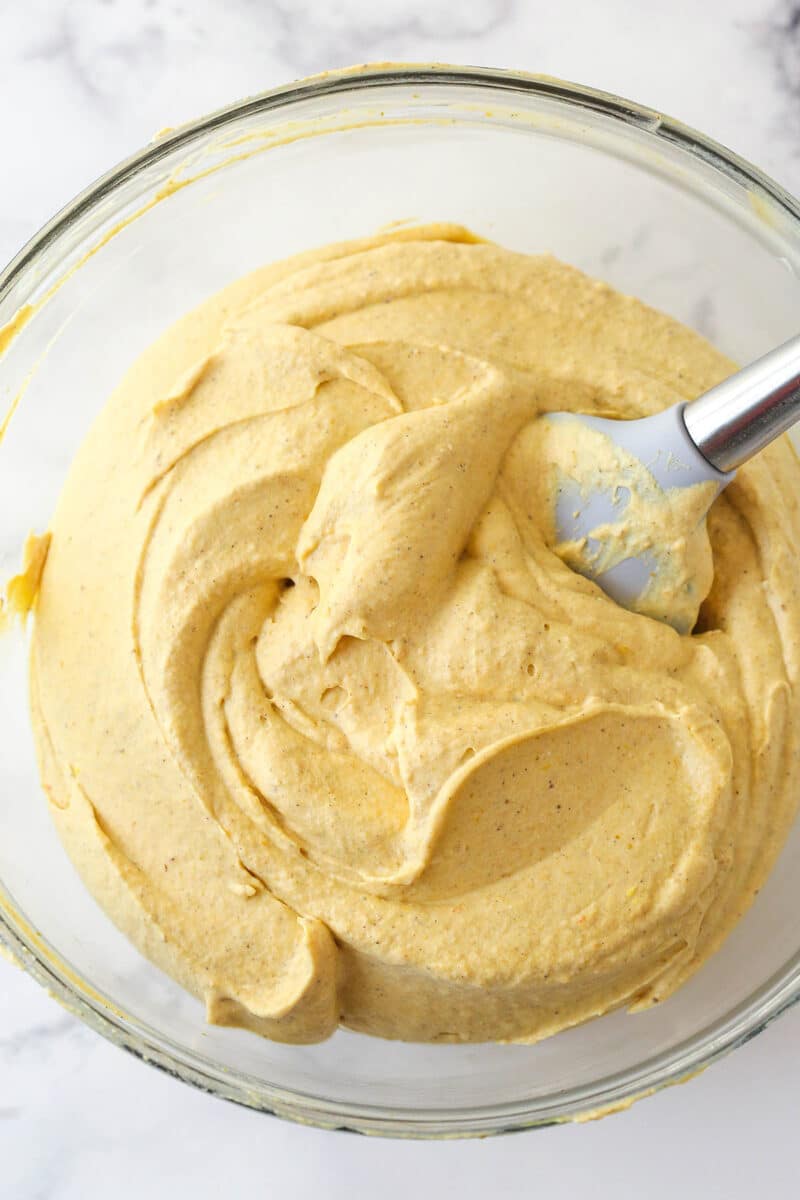 The filling for a Pumpkin Ice Cream Pie in a glass bowl.