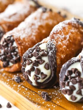 Homemade cannoli on a cutting board