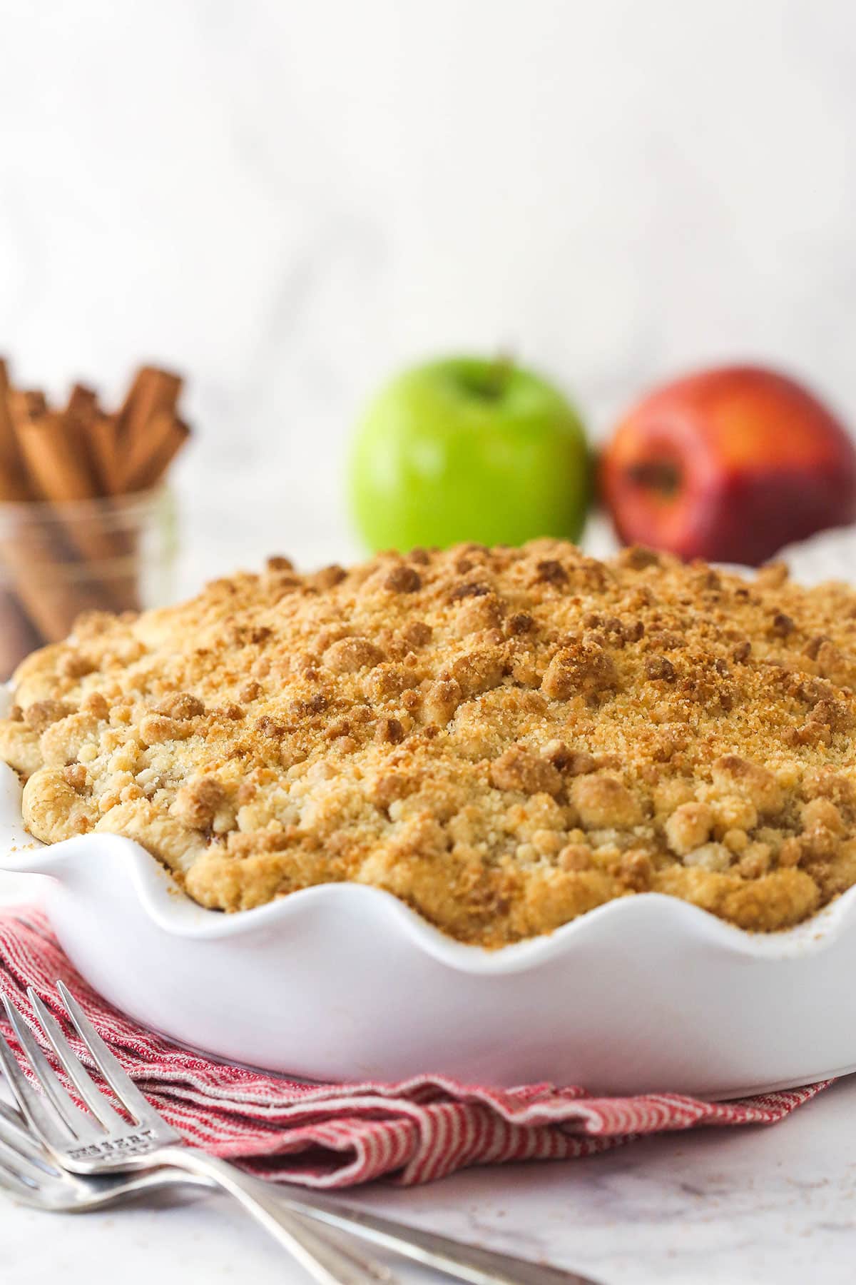 Dutch apple pie in white pie pan