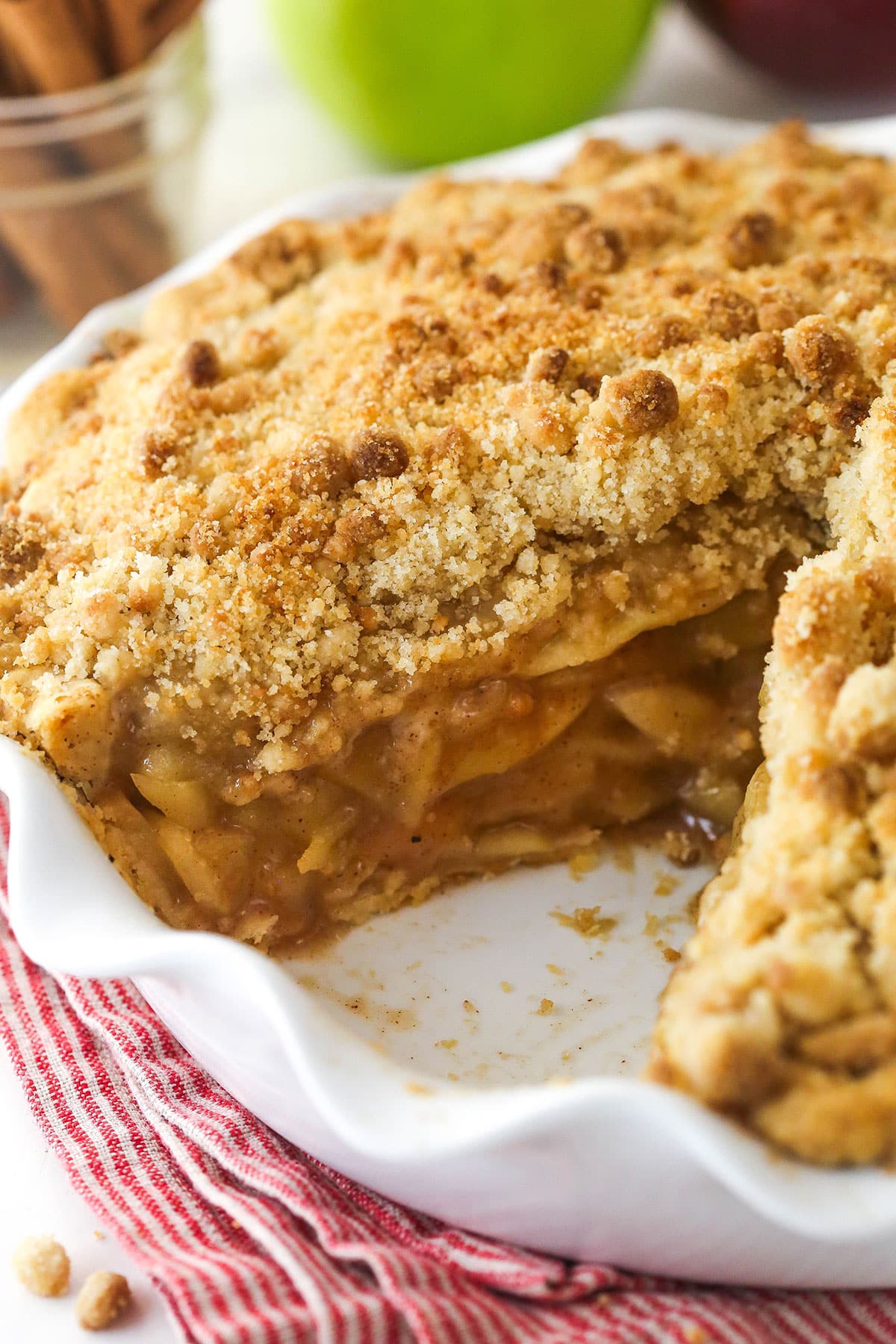 Dutch apple pie with a slice missing