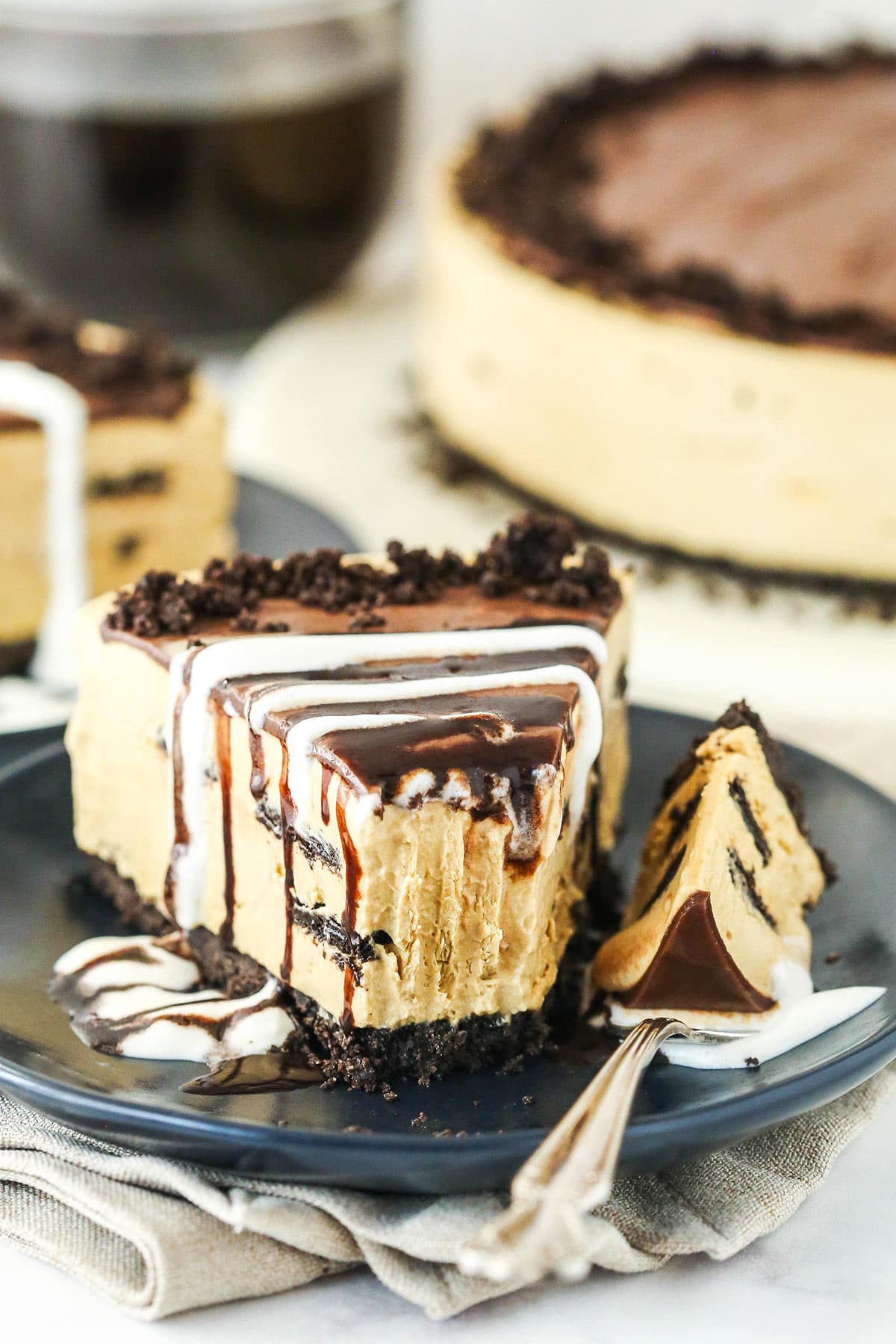 A slice of Kahlua Ice Cream Pie with a bite removed.