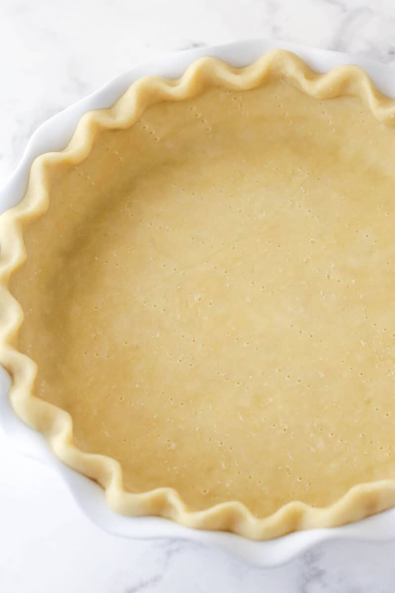 Unbaked pie crust in a pie dish