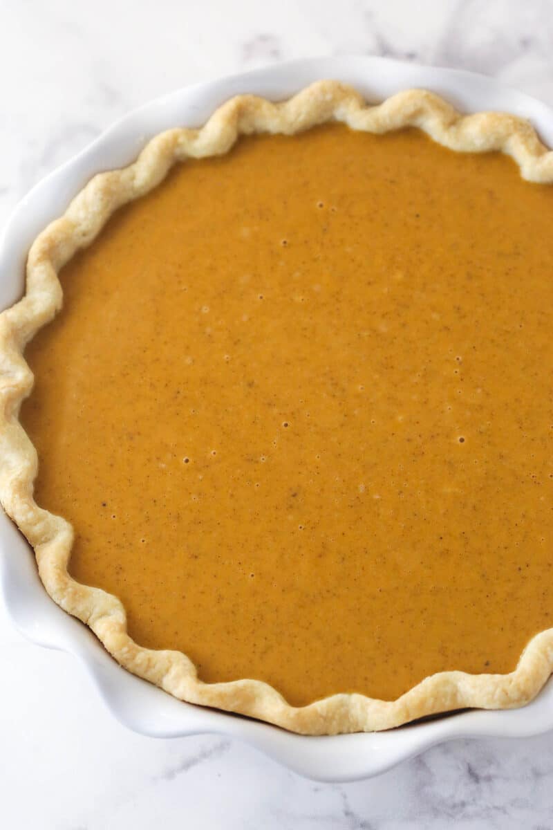 Pumpkin pie filling in a pie crust