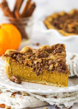 A slice of praline pumpkin pie on a white plate.