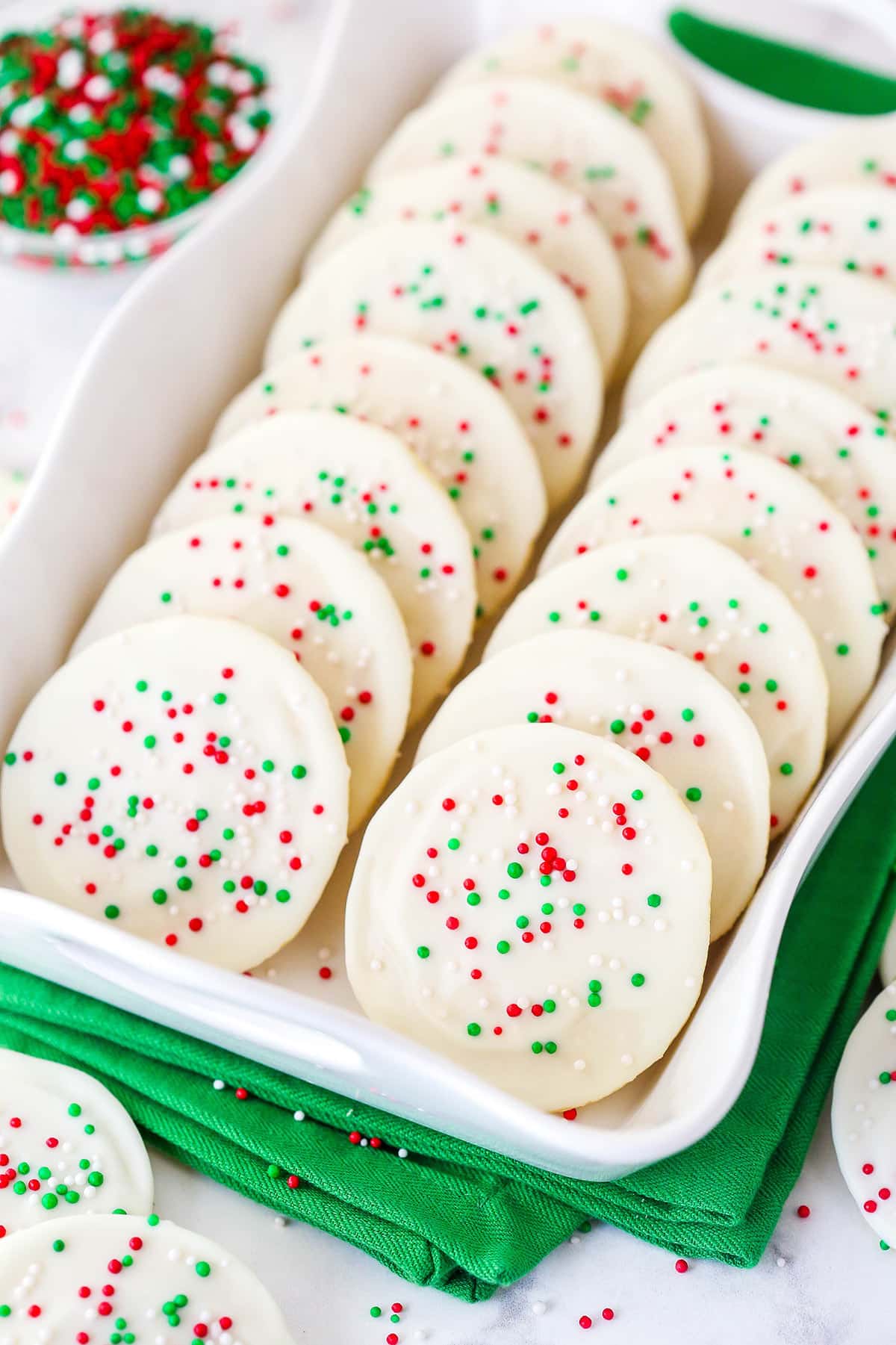 Two rows of Cakey Christmas Cookies on a white tray.